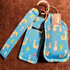 Travel hand sanitizer and chapstick holder